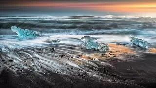 Diamond Beach juxtaposes glacial ice with lava sand. 