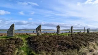 On the Scotland Spiritual Tour we'll the Ring of Broadgar, Stones of Stenness, and Maeshowe chambered tomb.