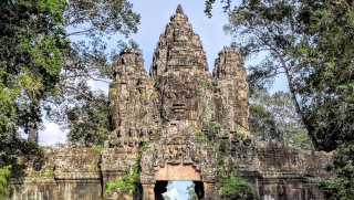 The Bayon Temple is part of the Angkor Wat complex we'll explore on this spiritual tour.